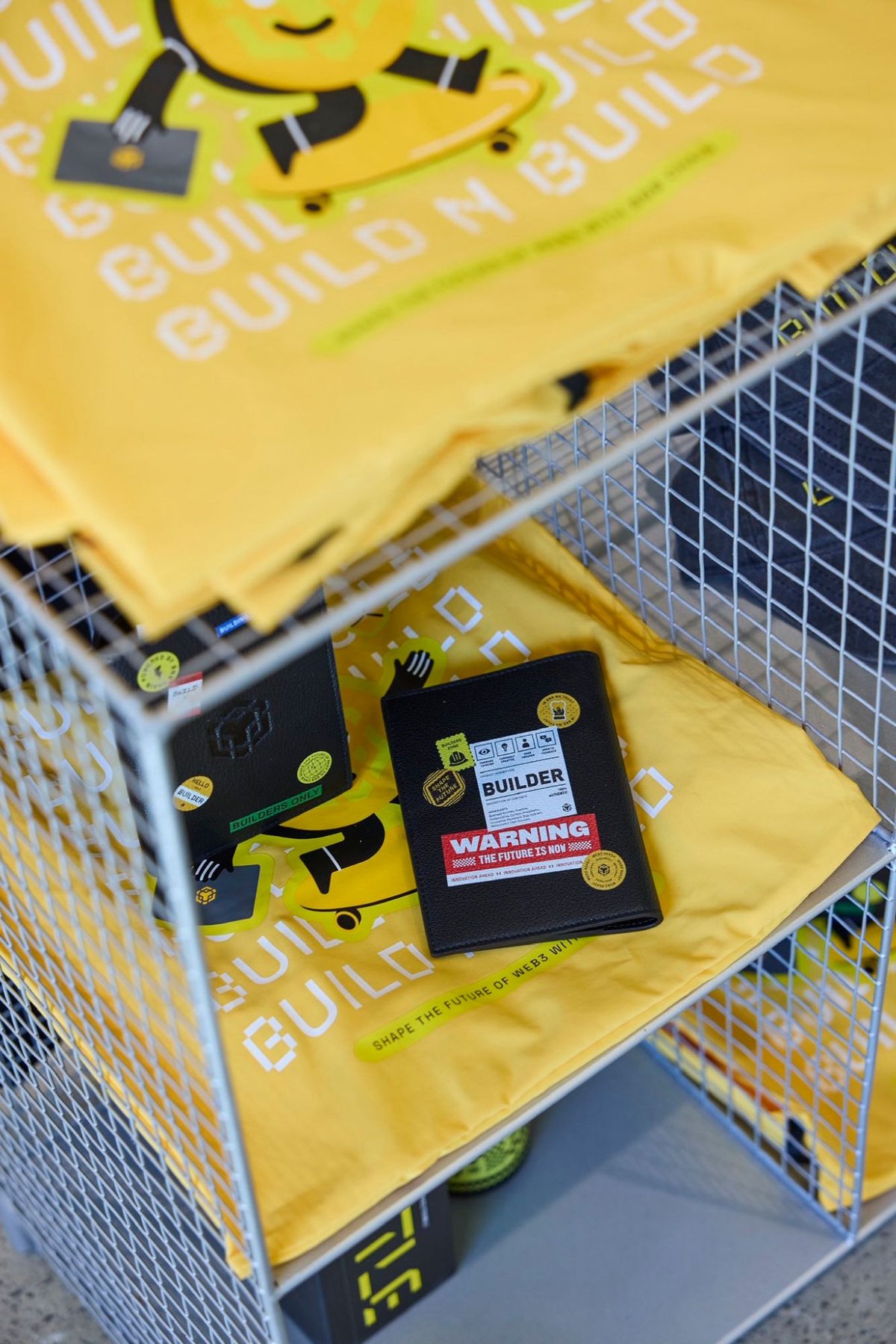 Close-up of the Builder card holder and yellow Build N Build tote bags from the anniversary box